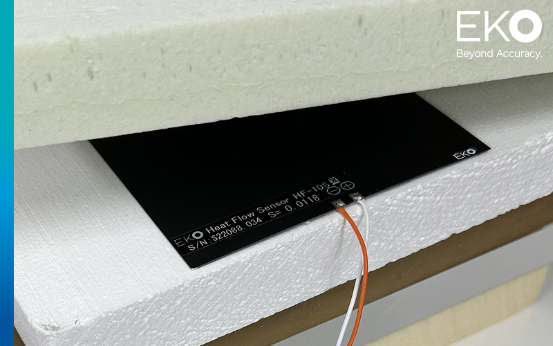 EKO HF-10S placed in between insulation layers to measure the heat flux passing through the body of the insulated system.